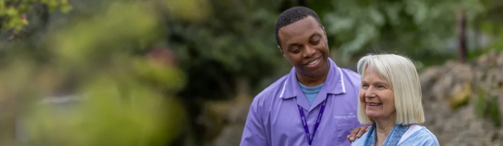 A man in a purple shirt.